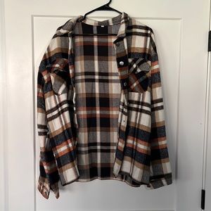 Orange, brown, tan, cream and navy Amazon Shacket. New. No tags but never worn.